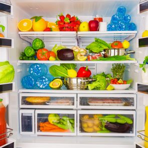 Open fridge full of fresh fruits and vegetables, healthy food background, organic nutrition, health care, dieting concept