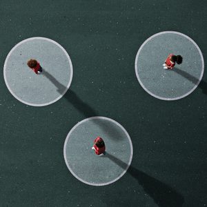 3 people standing in separate circles