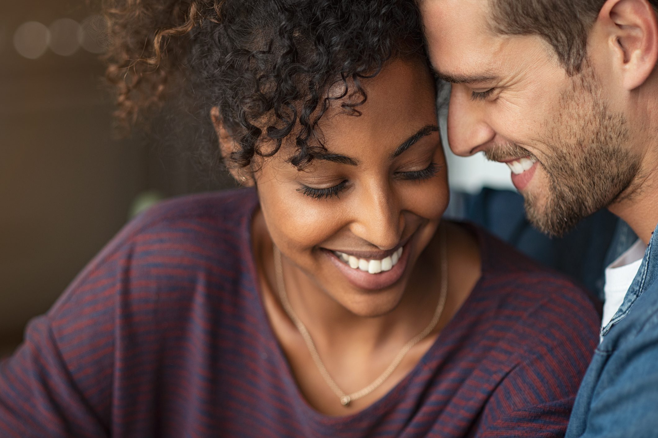 young romantic couple smiling together