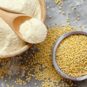 Hulled millet flour and grain top view