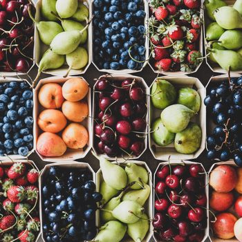 Summer Fruit And Berry Assortment Flat Lay Of Strawberries Cherries Grapes Blueberries Pears Apricots Figs In Eco Friendly Boxes Over Grey Background Top View Close Up Local Farmers Produce