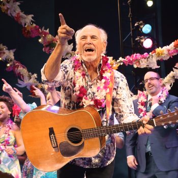 Jimmy Buffett with guitar Margaritaville